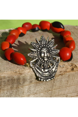 Bracelet en graines huayruro et son médaillon soleil et lune